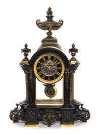 A French Neoclassical Ebonized Bronze and Slate Mantel Clock, Height 27 inches.
