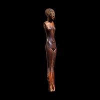 An Egyptian Wood Female Figure