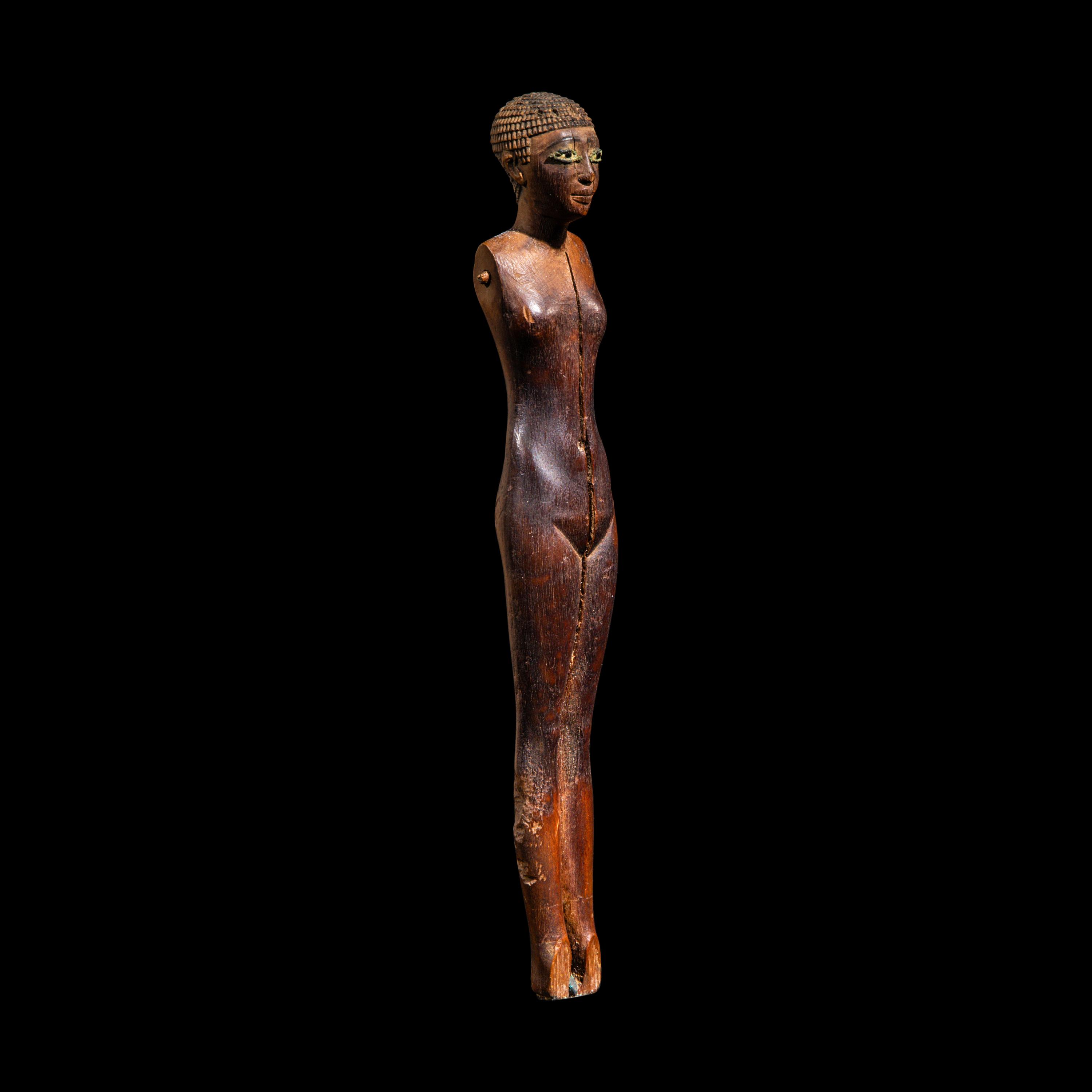 An Egyptian Wood Female Figure