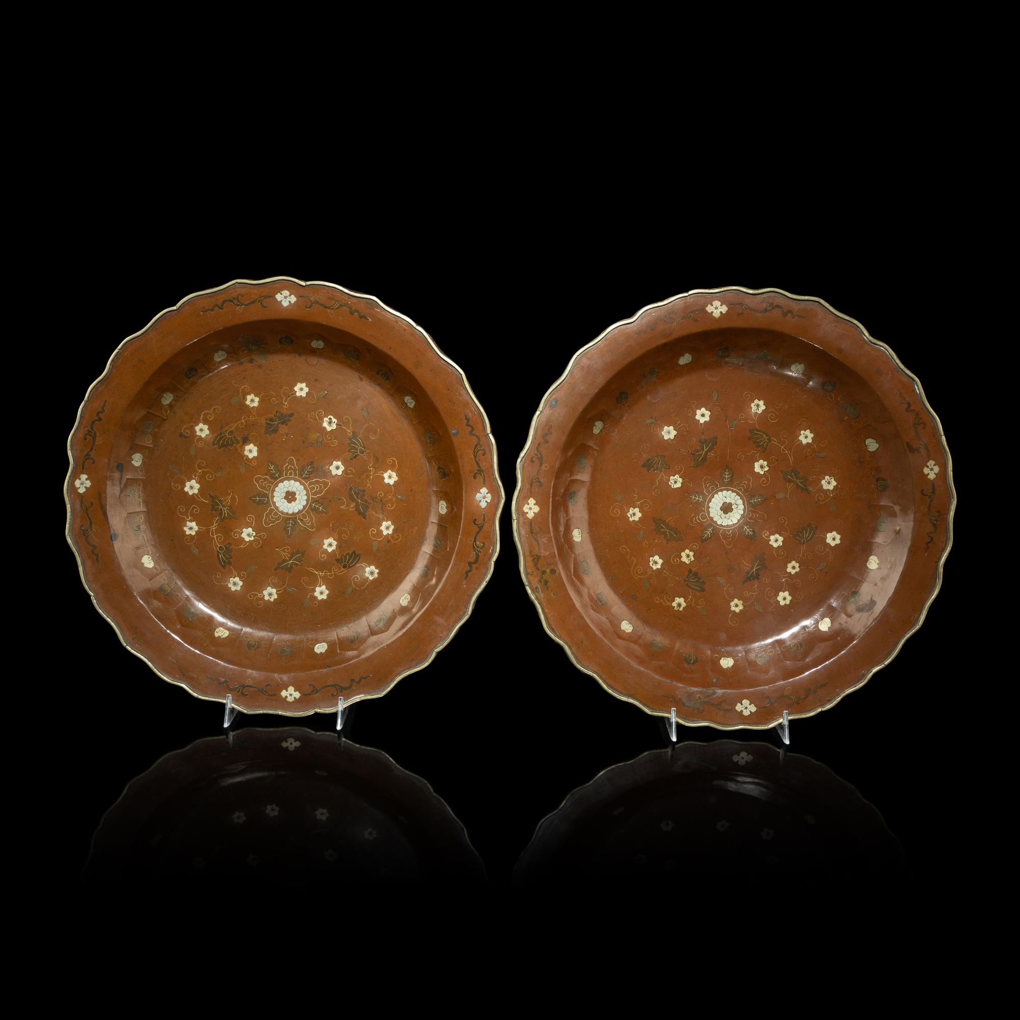 A Pair of Japanese Silver Inlaid Lacquered Chargers, 19th Century