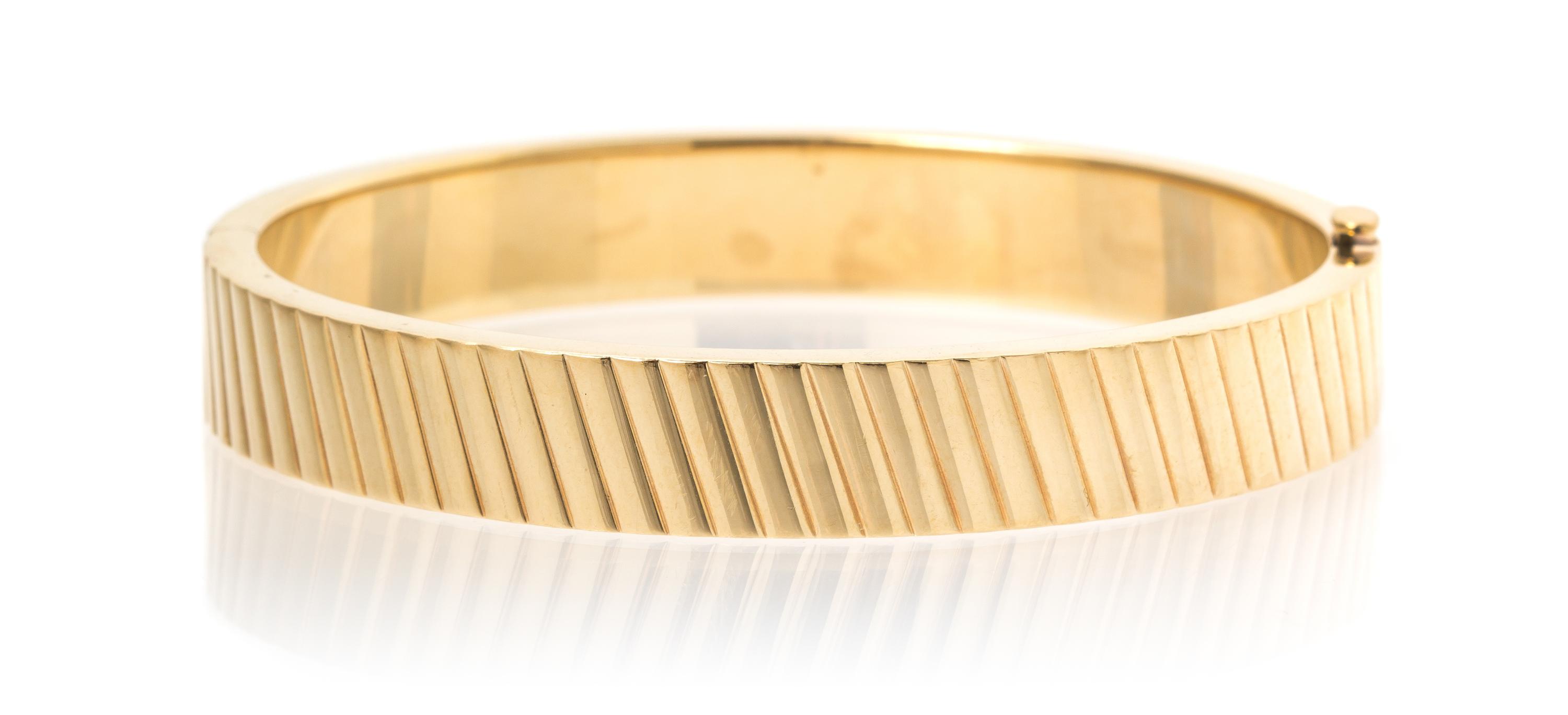 A 14 Karat Yellow Gold Bangle Bracelet, 12.70 dwts.