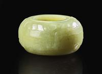 A Chinese carved greenish-yellow jade archaistic coupe Qing dynasty, 18th/19th century 倣古青黃玉水丞 清 十八或十九世紀