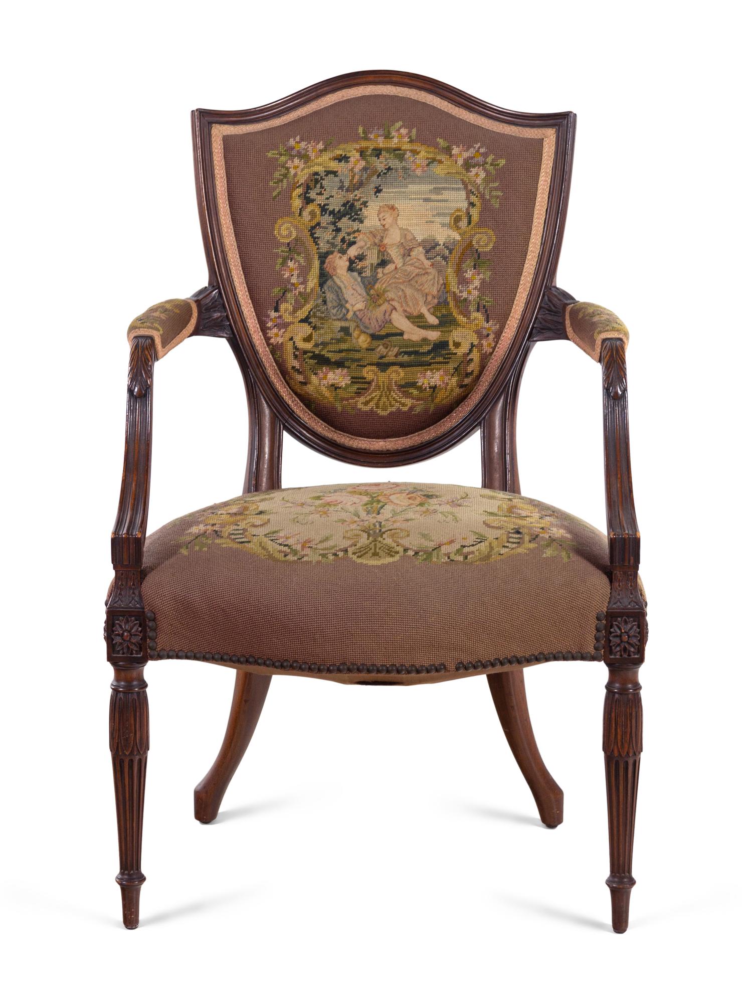 A Louis XVI Style Fauteuil with Needlepoint Upholstery