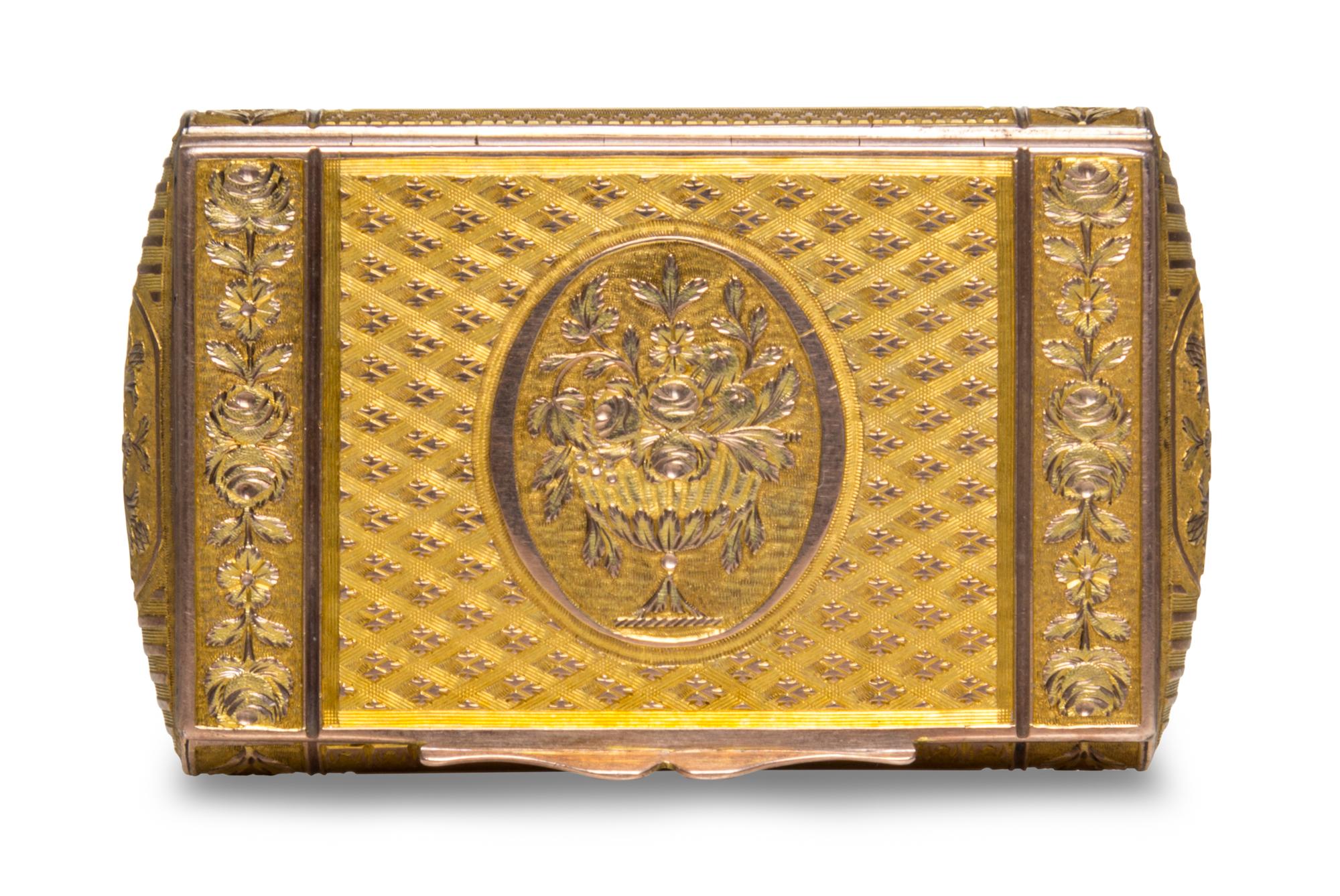 A Yellow Gold Patch Box, 19th/20th century, of rectangular form with rounded edges, the lid centered with an urn issuing flowers.