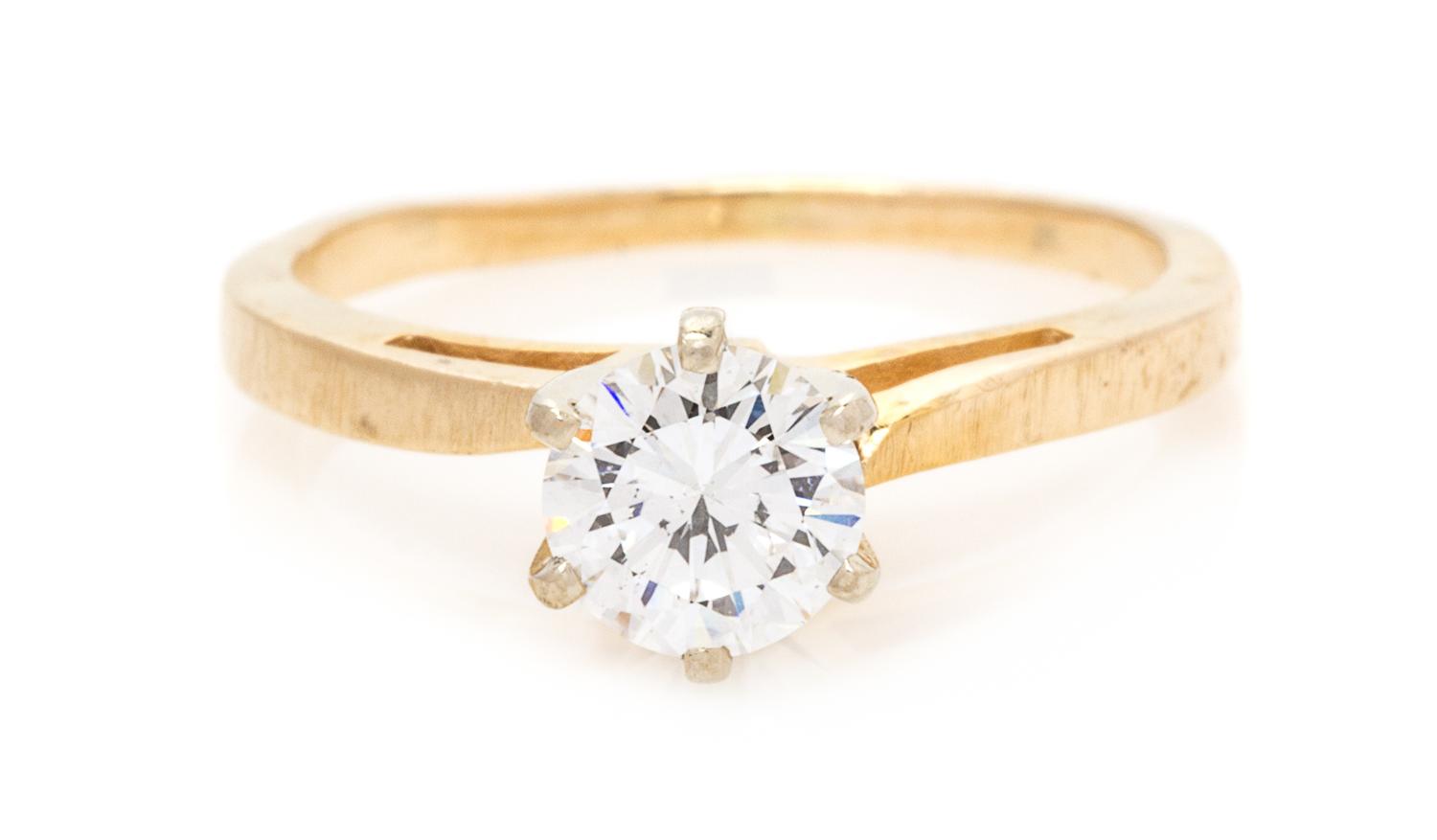 A Yellow Gold and Diamond Solitaire Ring, 1.50 dwts.