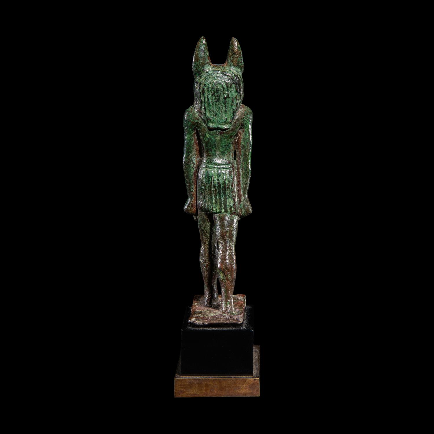 An Egyptian Bronze Striding Anubis