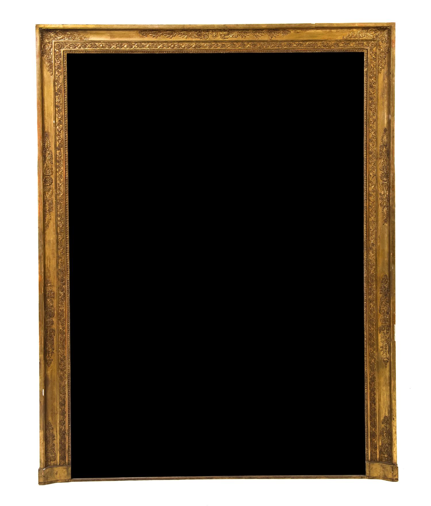 An Empire Style Giltwood Over Mantel Mirror, Height 68 1/4 x width 51 1/2 inches.