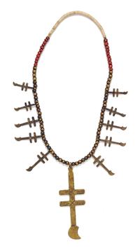 A Bronze Isleta Dragonfly Cross Necklace, 63.60 dwts.