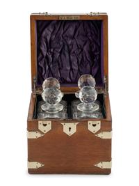 An English Mahogany Cased Four-Bottle Decanter Set