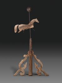 A Primitive Carved Pine and Cast Iron Horse Weathervane on Stand