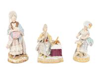Three Meissen Porcelain Figures of Ladies in Lacy Dresses