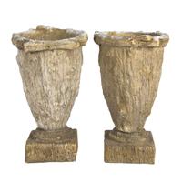 A Pair of Composition Garden Urns Height 16 inches.