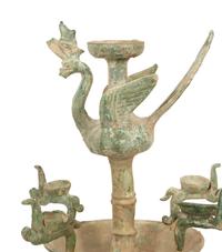A Han Pottery Phoenix Oil Lamp