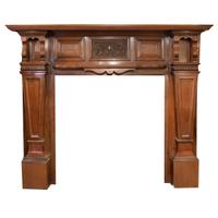 A Heavily Carved Walnut Half Mantel 63" W x 12" D x 54.5" H — England, Circa 1880