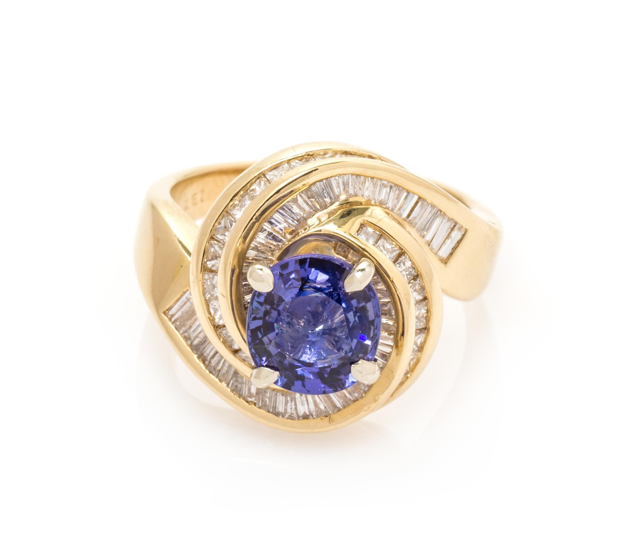A 14 Karat Yellow Gold, Tanzanite and Diamond Ring, 6.20 dwts.