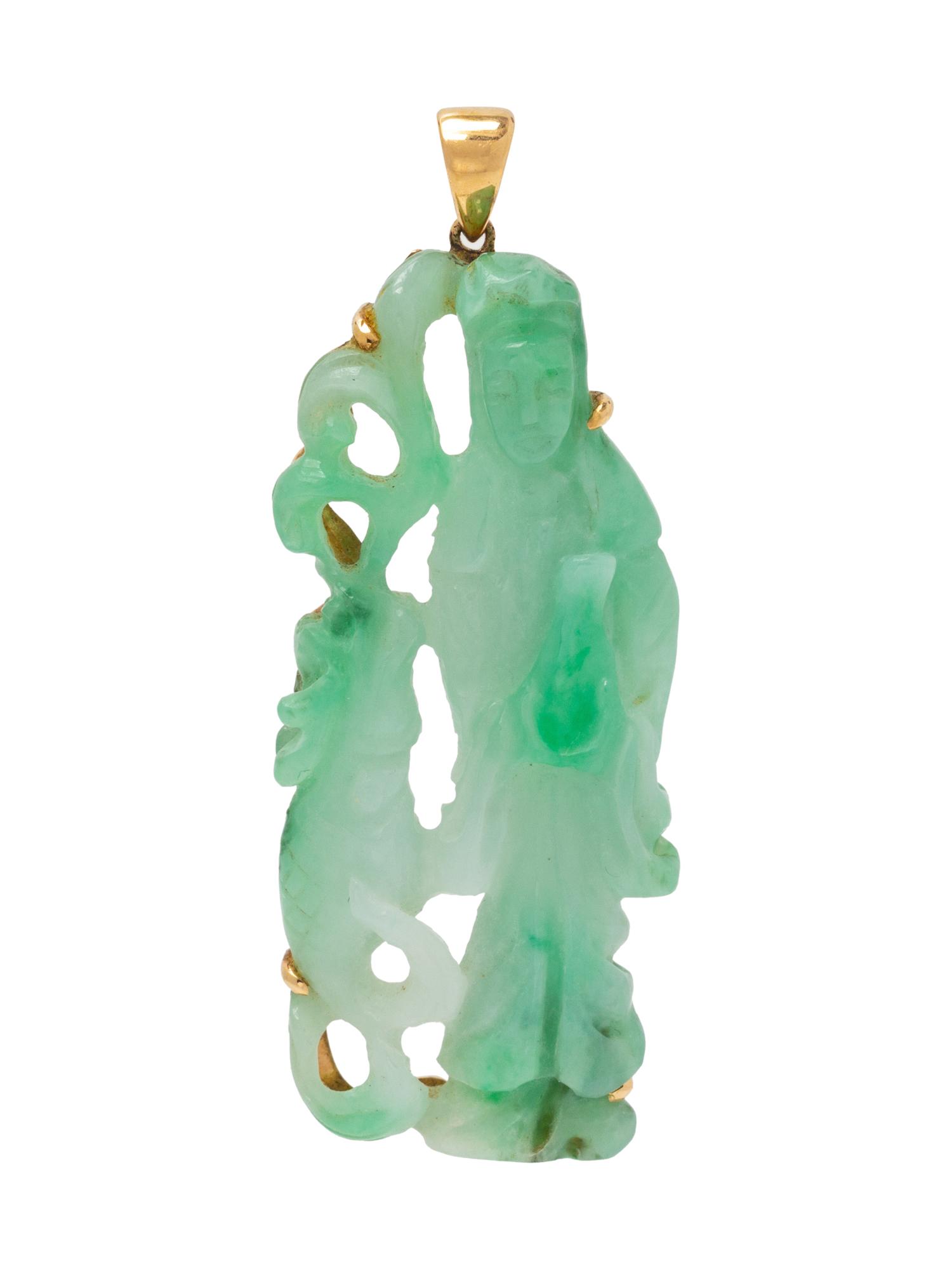 A 14 Karat Yellow Gold and Jade Pendant,