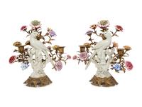 A Pair of Gilt Bronze and Porcelain Three-Light Candelabra