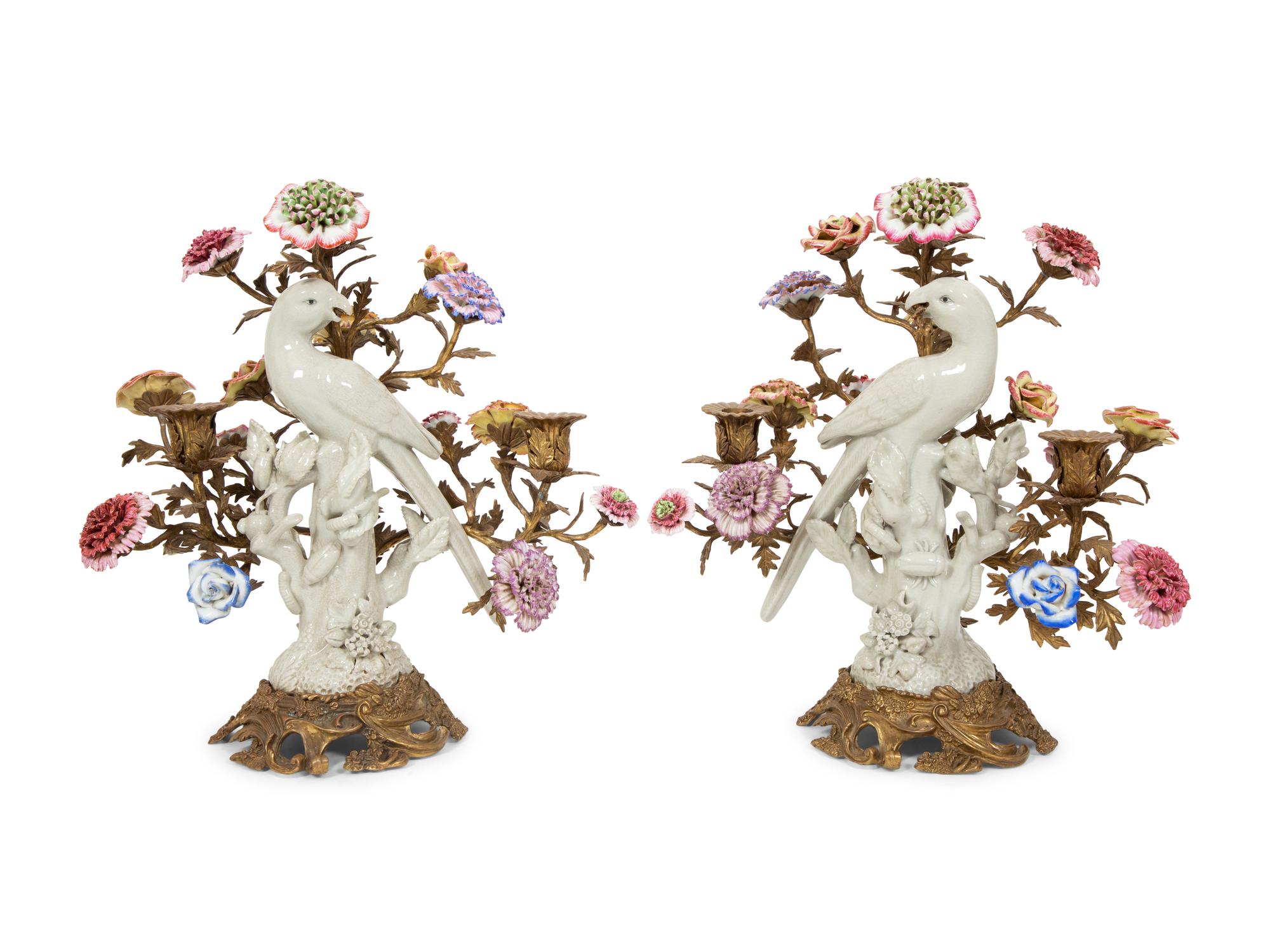 A Pair of Gilt Bronze and Porcelain Three-Light Candelabra