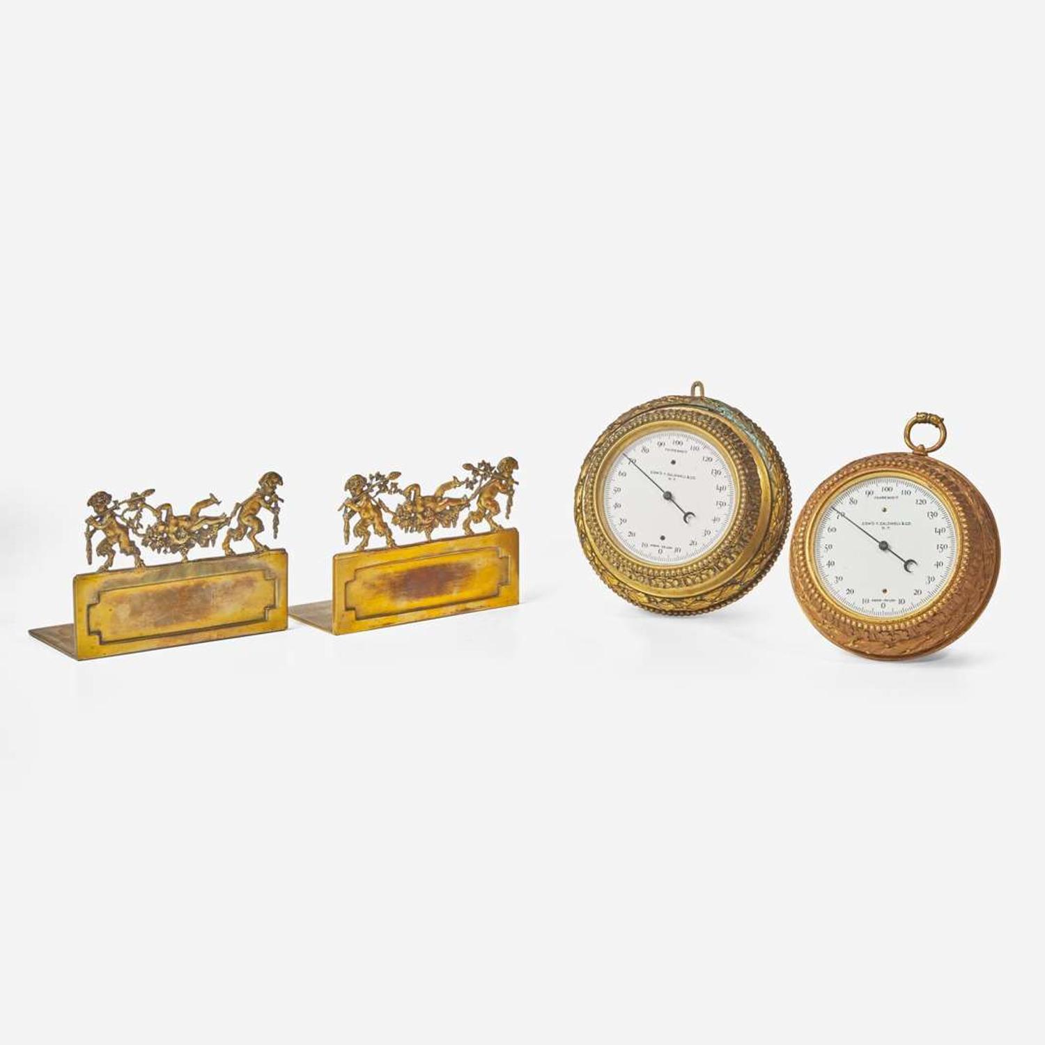 Two gilt bronze wall barometers and pair of gilt bronze bookends Edward F. Caldwell & Co. (active 1895-1959), New York, NY, early 20th century