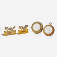 Two gilt bronze wall barometers and pair of gilt bronze bookends Edward F. Caldwell & Co. (active 1895-1959), New York, NY, early 20th century