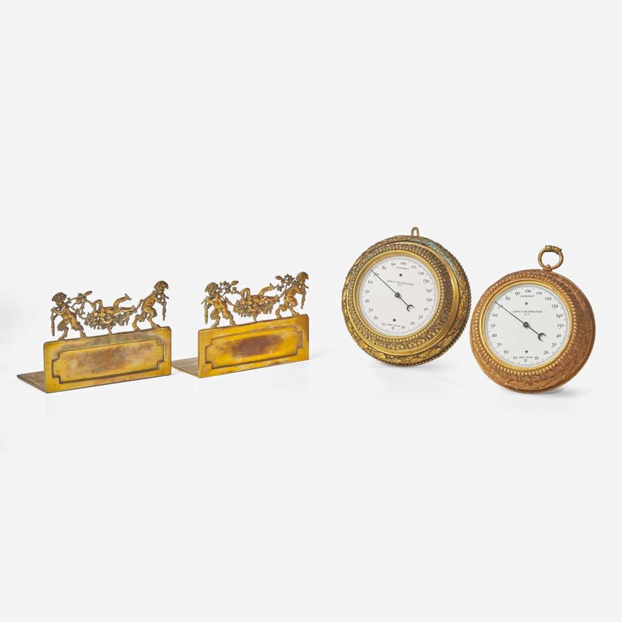 Two gilt bronze wall barometers and pair of gilt bronze bookends Edward F. Caldwell & Co. (active 1895-1959), New York, NY, early 20th century