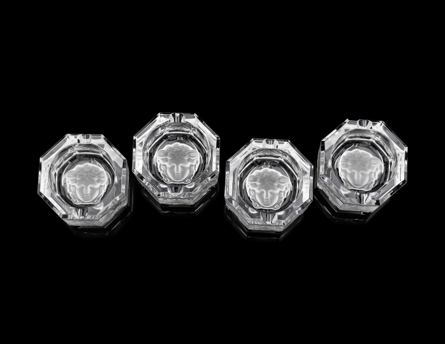 A Group of Versace Medusa Lumiere Glass Articles