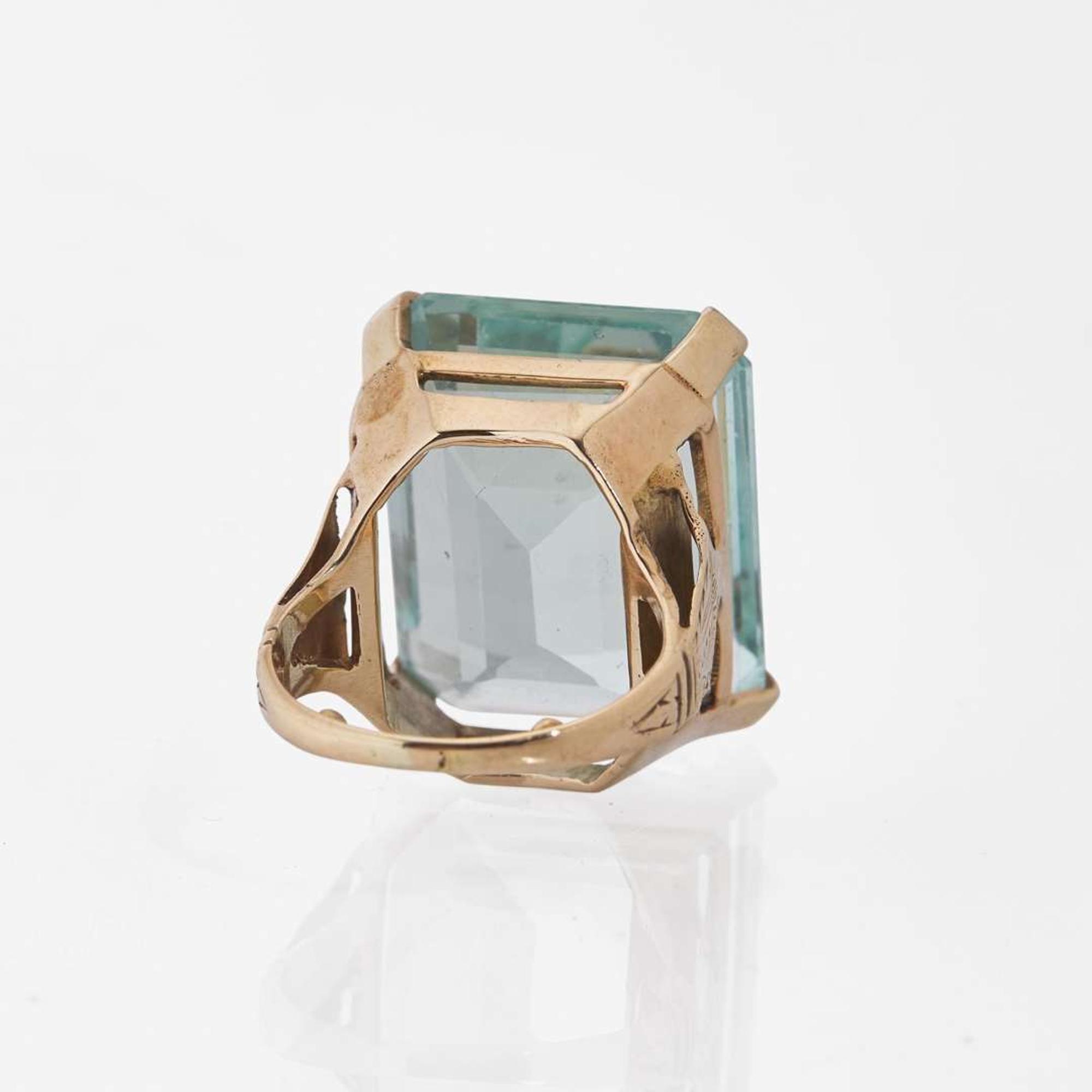 A 14K Yellow Gold and Aquamarine ring