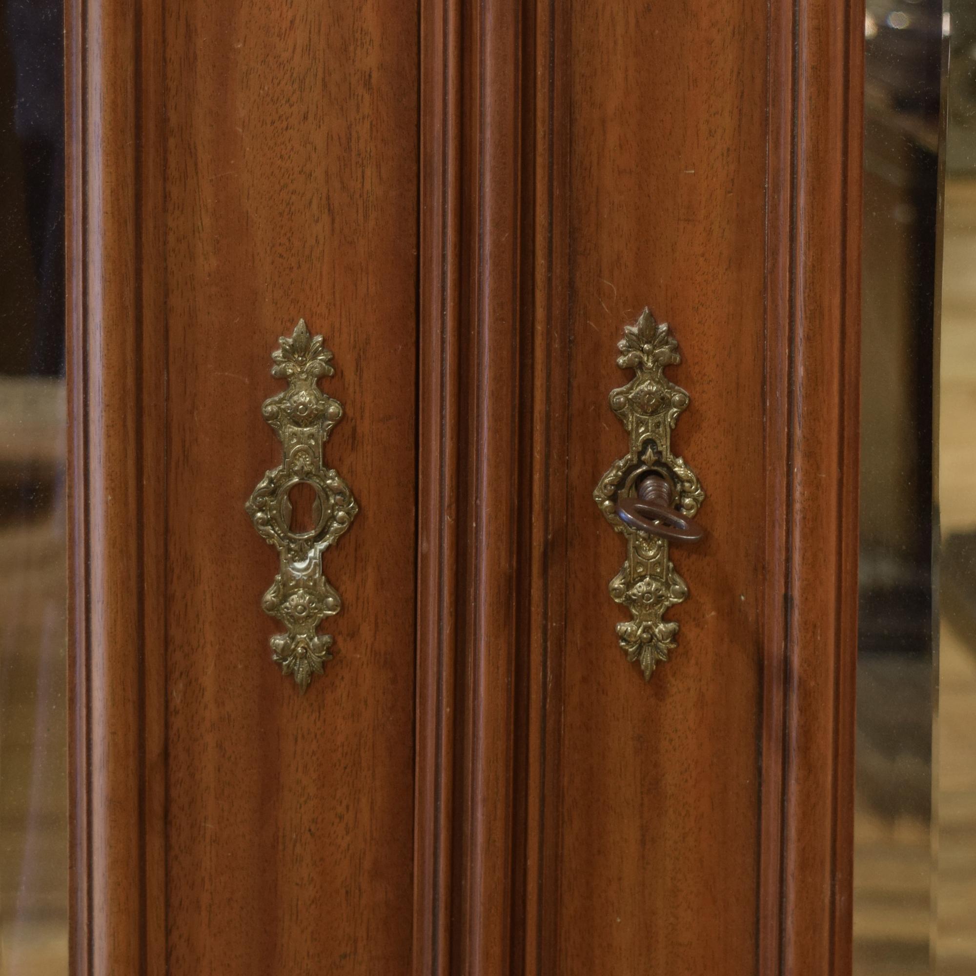 A Victorian Walnut Two Door Armoire 52" W x 22" D x 83" H — United States, Circa 1880