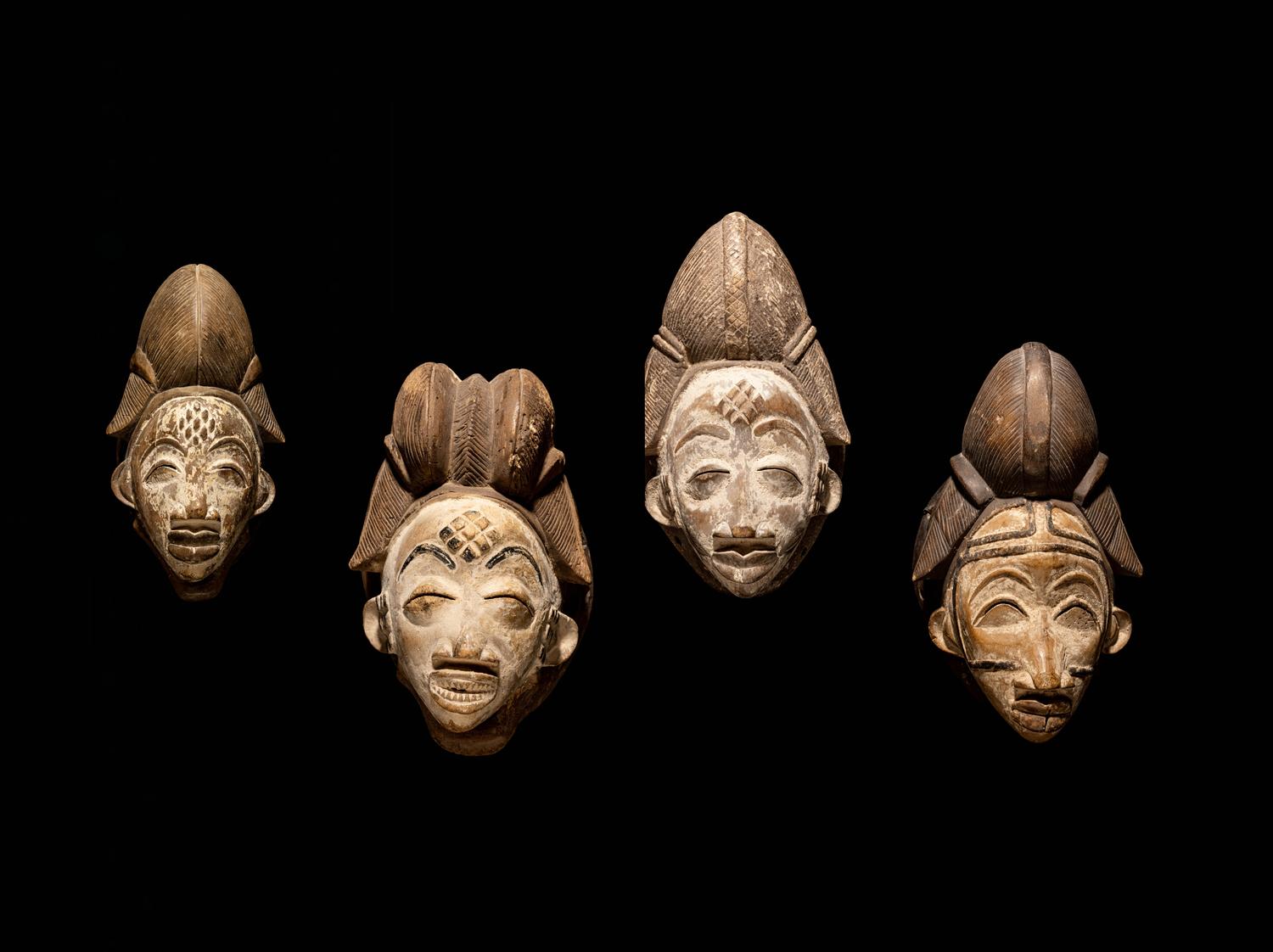 Four Punu Wood Masks