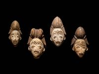 Four Punu Wood Masks