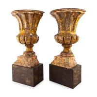 A Pair of Italian Giltwood Flat-Back Urns