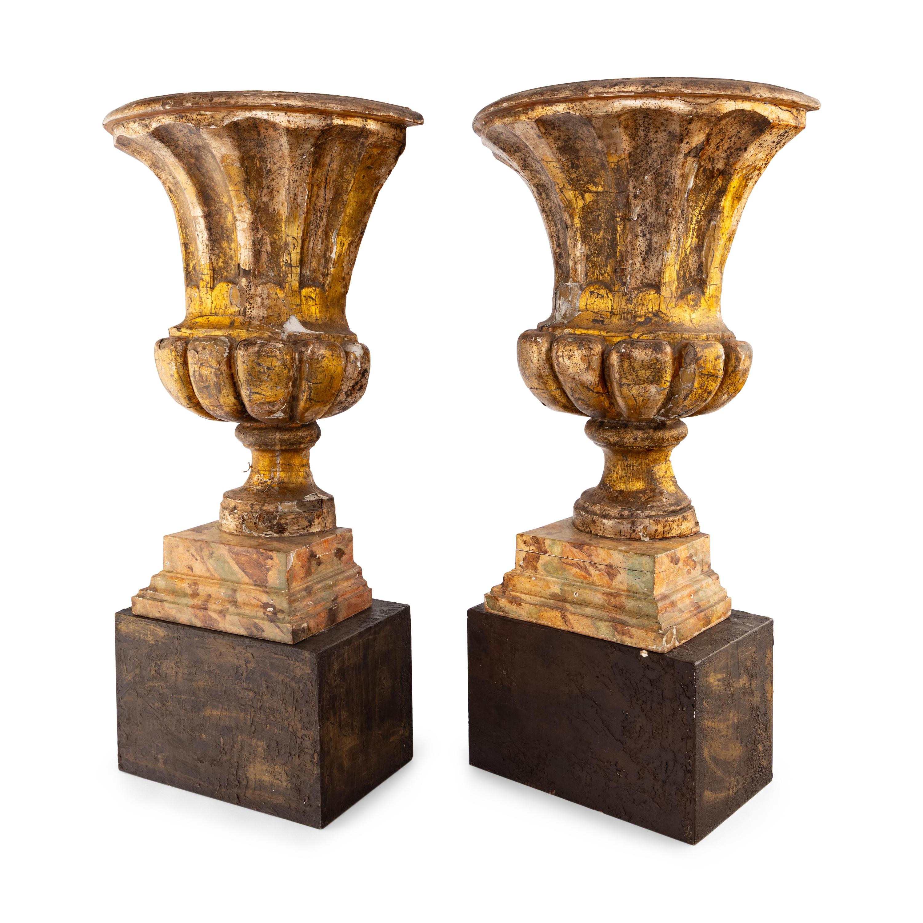 A Pair of Italian Giltwood Flat-Back Urns