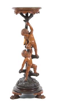 A Continental Carved Figural Pedestal, Height 41 3/4 inches.