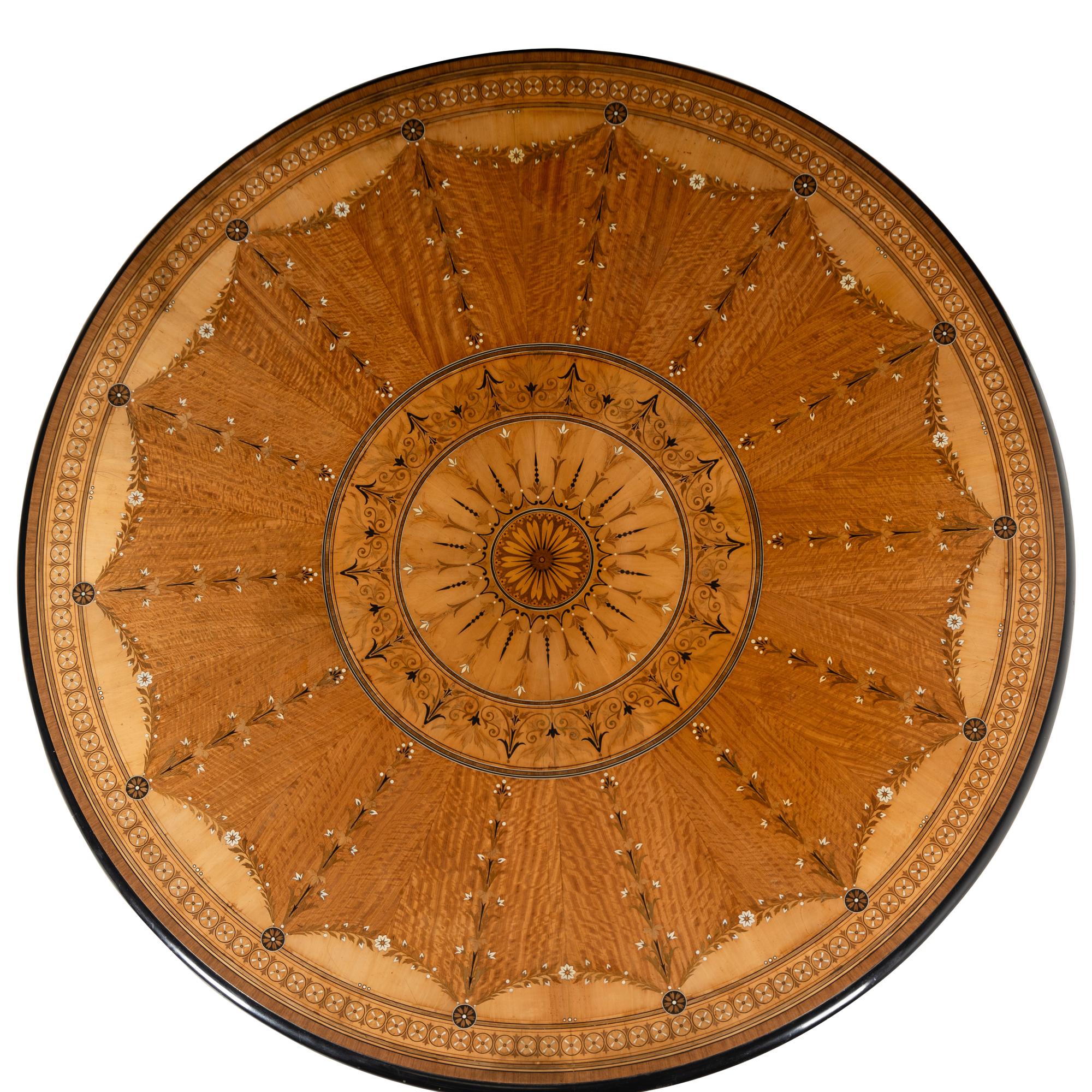 An English Part-Ebonized Satinwood, Harewood and Marquetry Center Table
