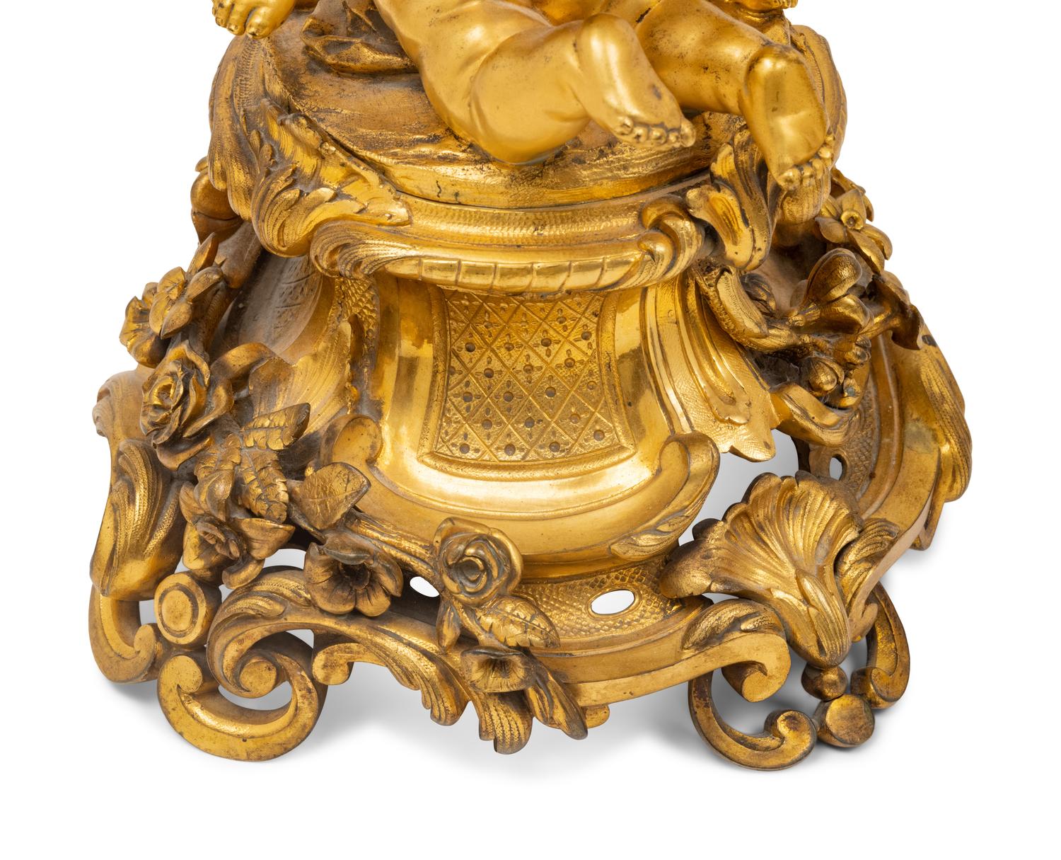 A Pair of Louis XV Style Gilt Bronze Figural Ten-Light Candelabra