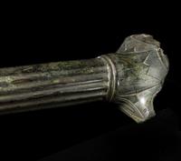 A Roman Bronze Handle with a Ram's Head