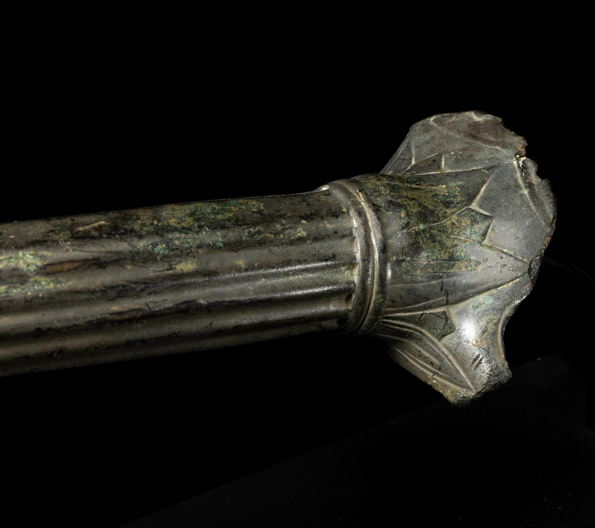 A Roman Bronze Handle with a Ram's Head