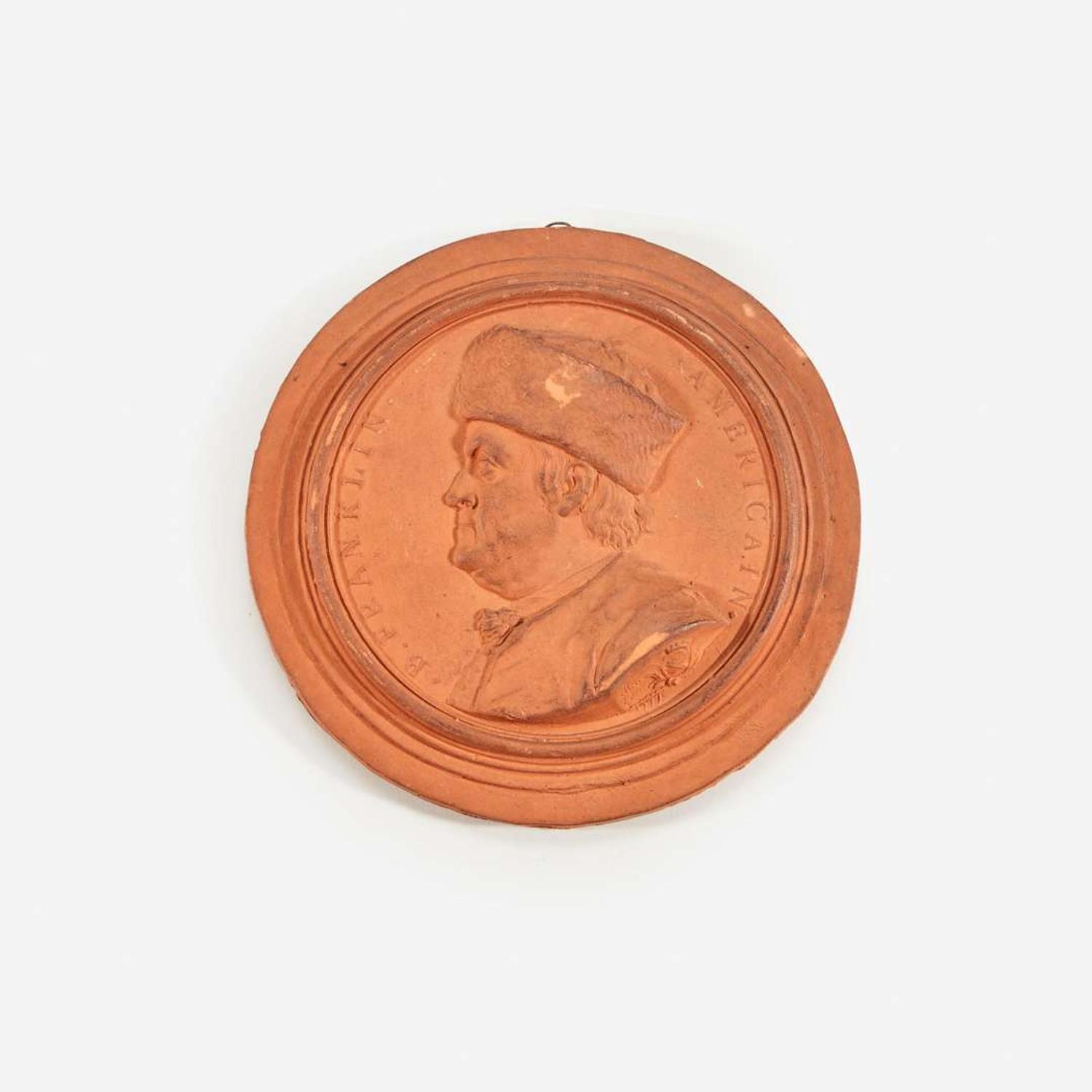 Jean-Baptiste Nini (French, 1717-1786) A terracotta bas-relief portrait medallion of Benjamin Franklin (1706-1790), dated 1777
