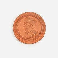 Jean-Baptiste Nini (French, 1717-1786) A terracotta bas-relief portrait medallion of Benjamin Franklin (1706-1790), dated 1777