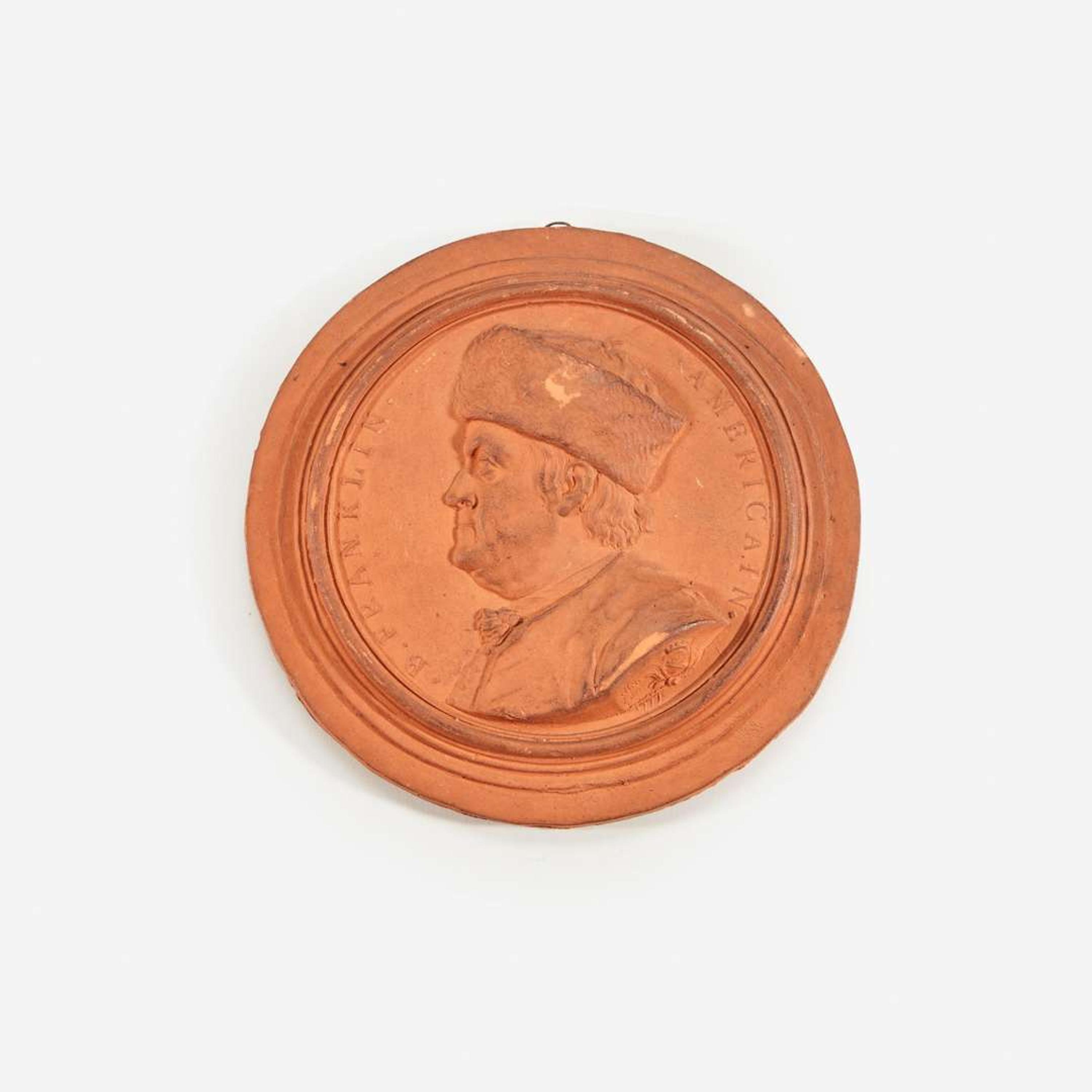 Jean-Baptiste Nini (French, 1717-1786) A terracotta bas-relief portrait medallion of Benjamin Franklin (1706-1790), dated 1777