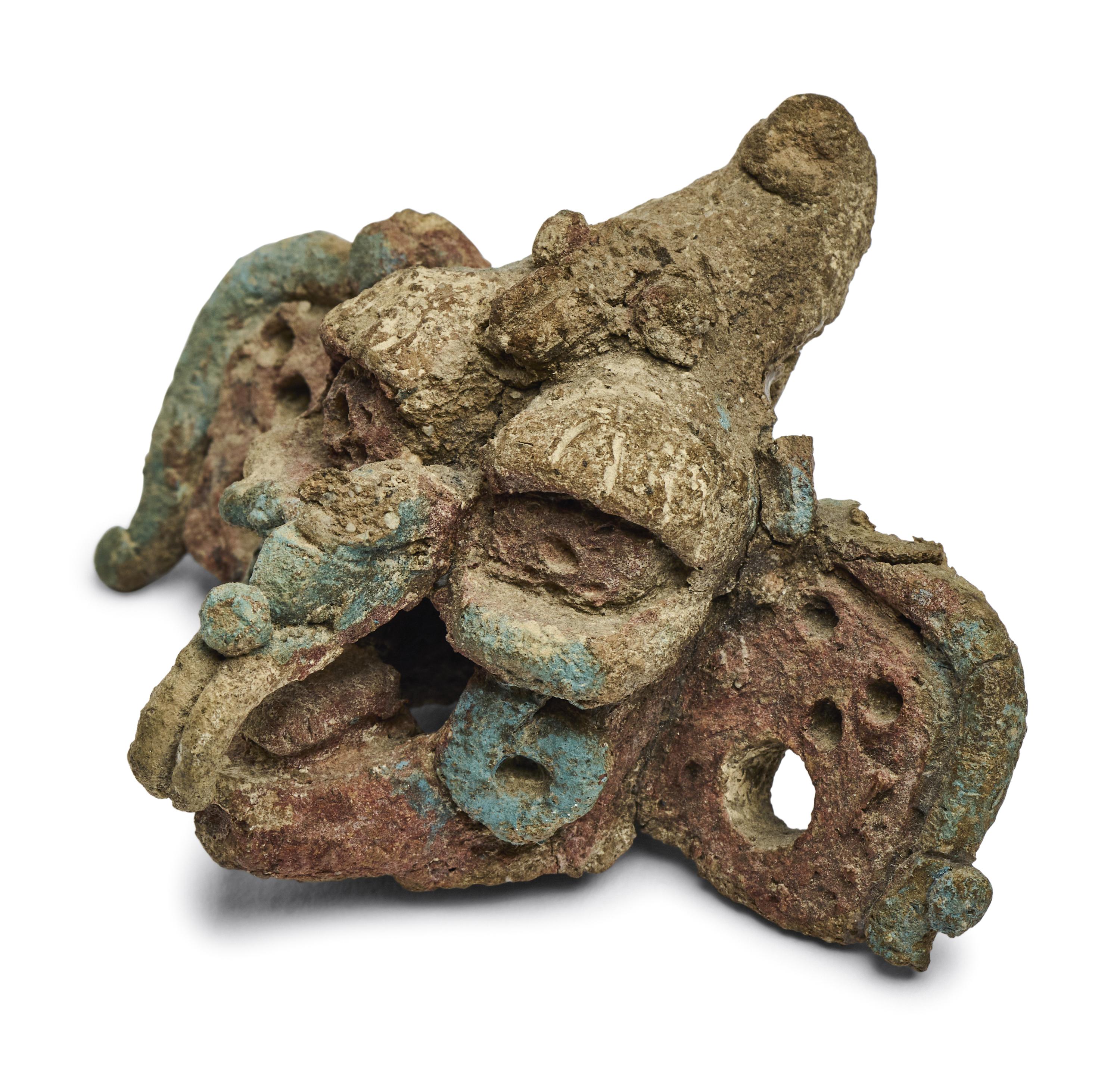 A Maya Polychrome Terracotta Head of a Deity