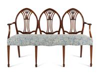 A George III Mahogany Triple-Back Settee