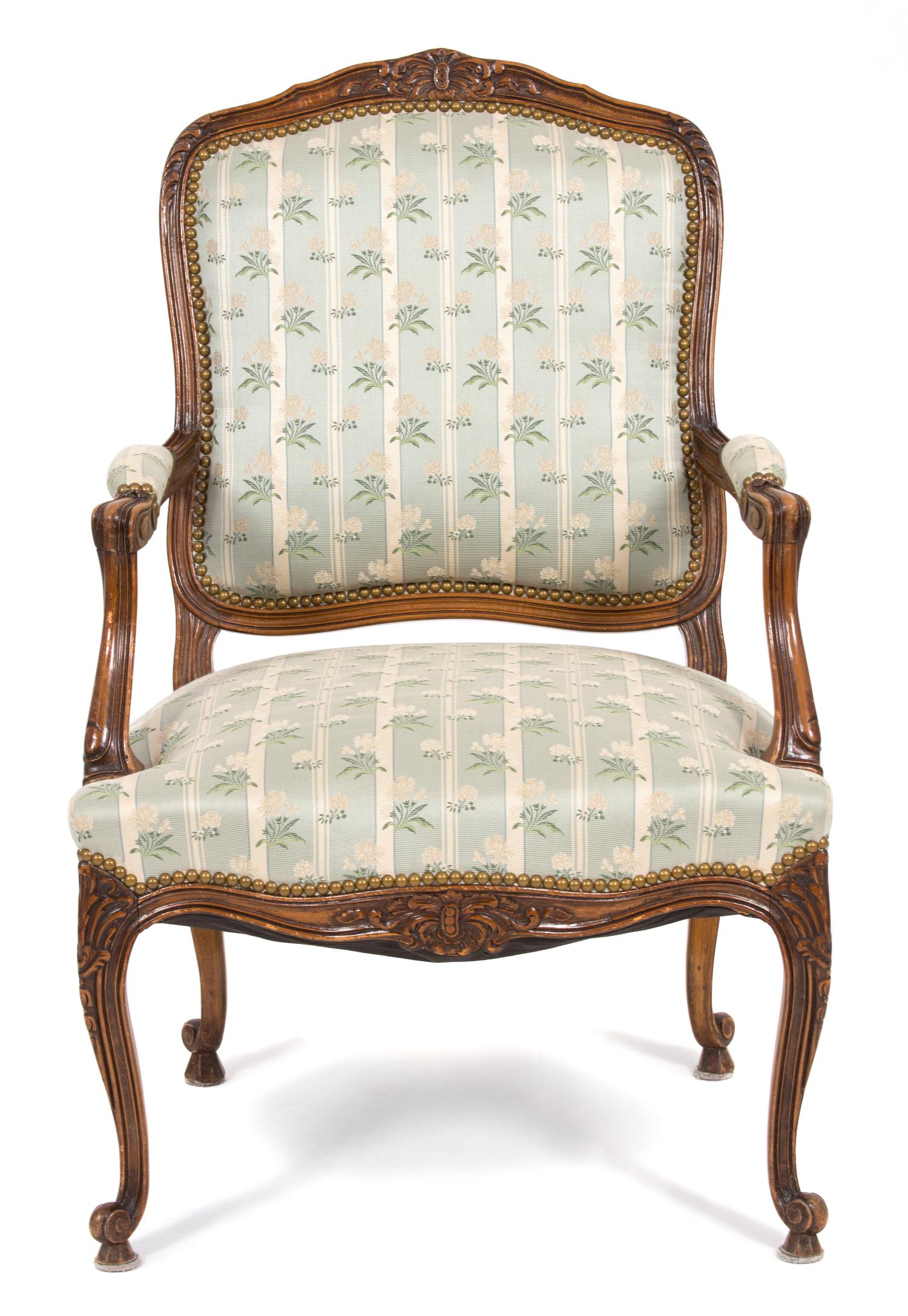 A Louis XV Style Carved Walnut Fauteuil — 19TH CENTURY