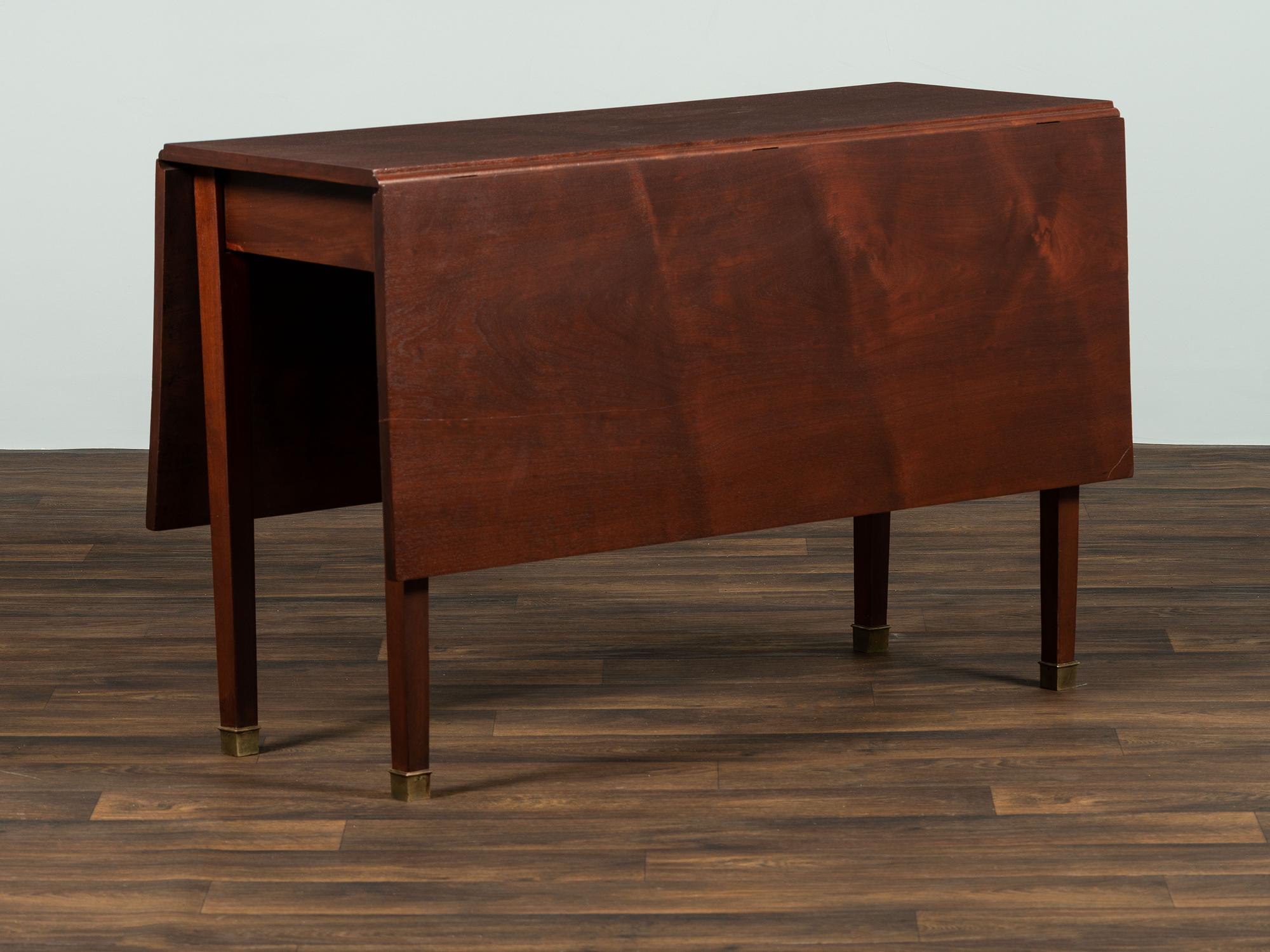 A George III Mahogany Drop-Leaf Dining Table