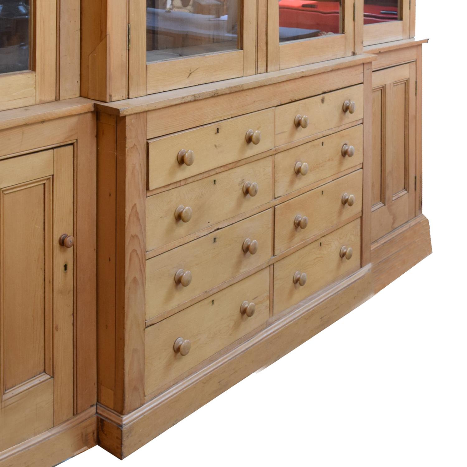A Pine Breakfront Cabinet 121" W x 24.5" D x 99" H — Englland, 20th Century