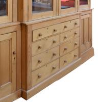 A Pine Breakfront Cabinet 121" W x 24.5" D x 99" H — Englland, 20th Century