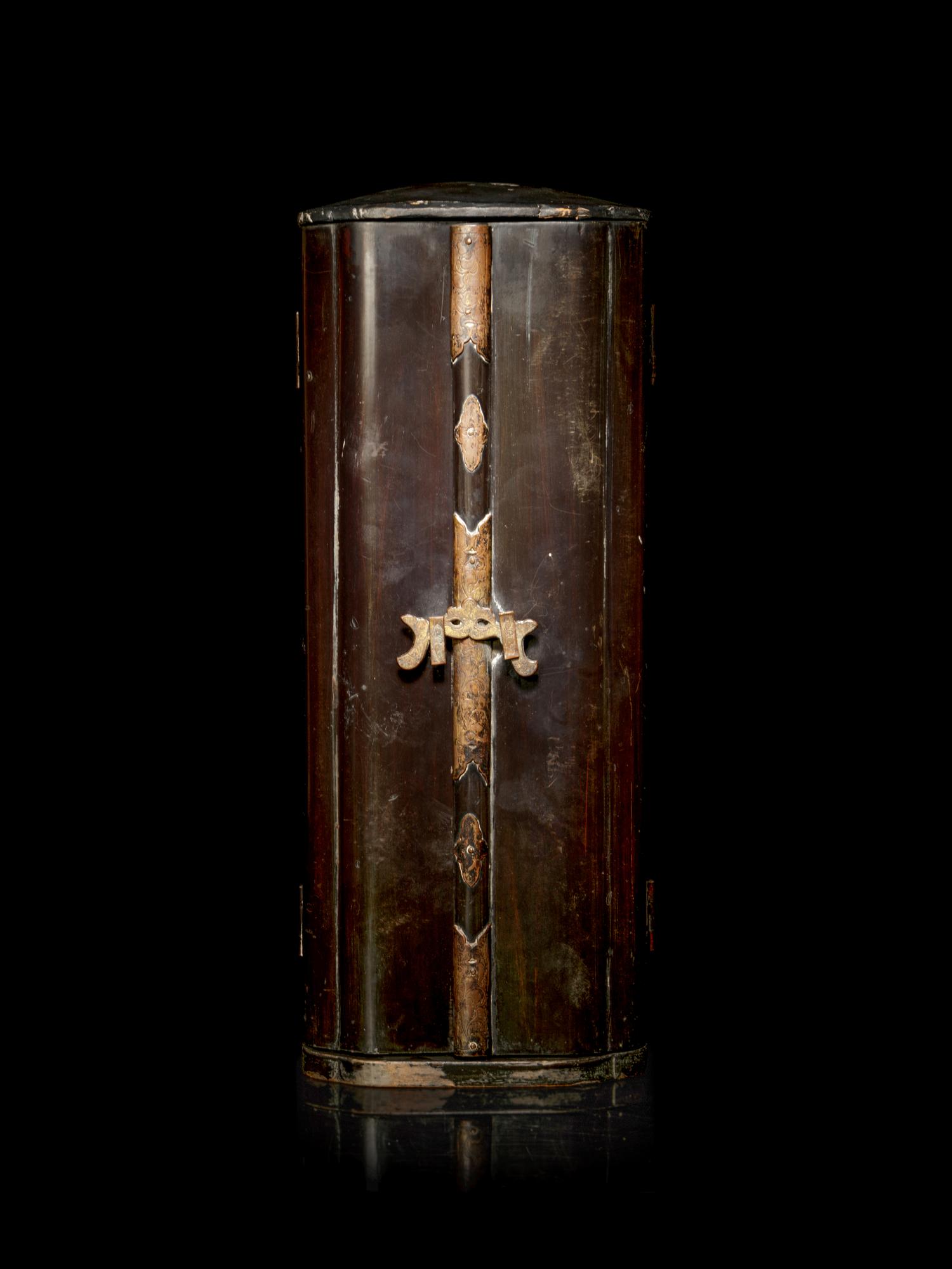 A Black Lacquered Shrine with a Polychrome and Black Painted Wood Figure of a Guardian