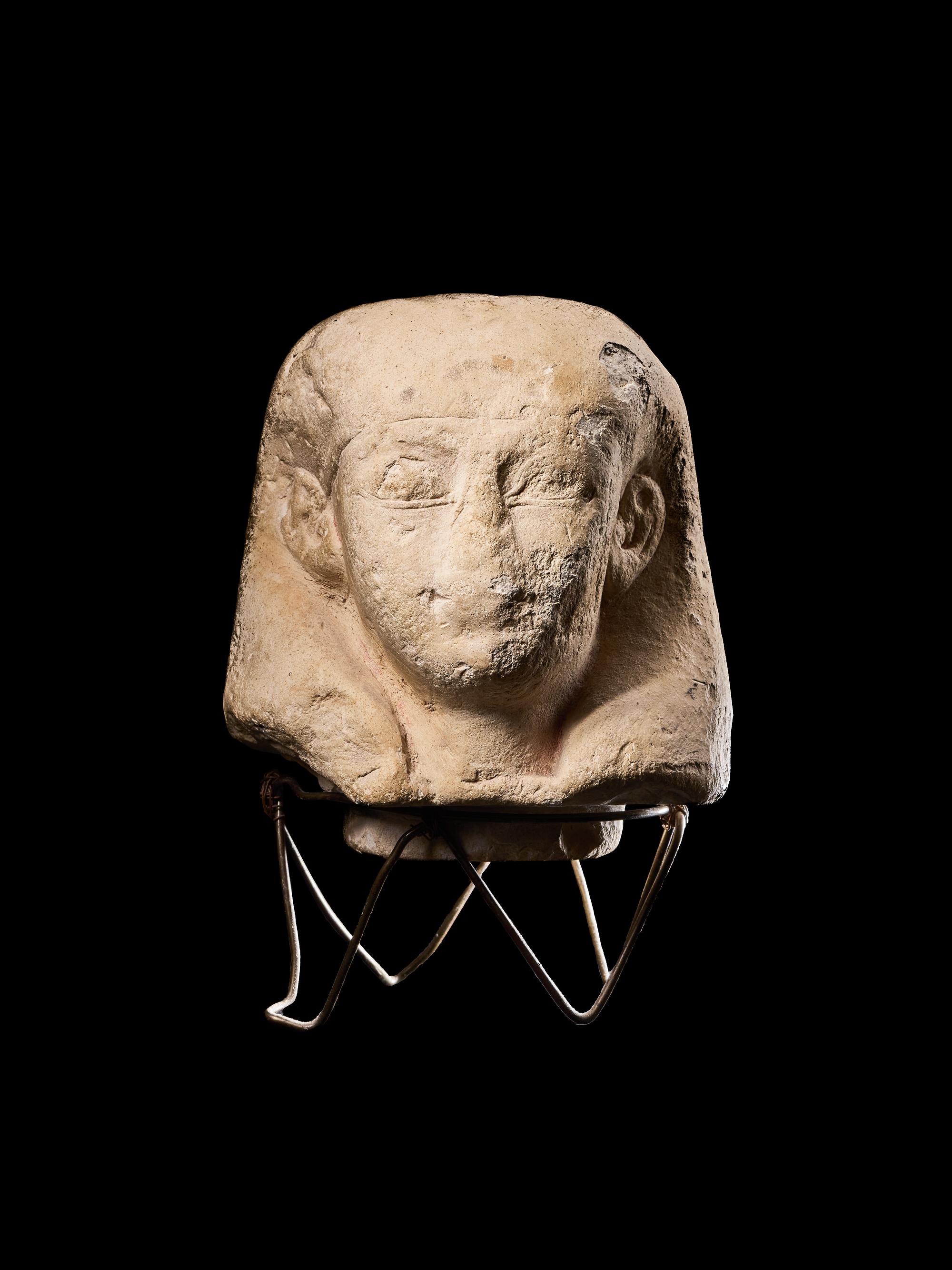 An Egyptian Limestone Canopic Jar Lid for Imseti