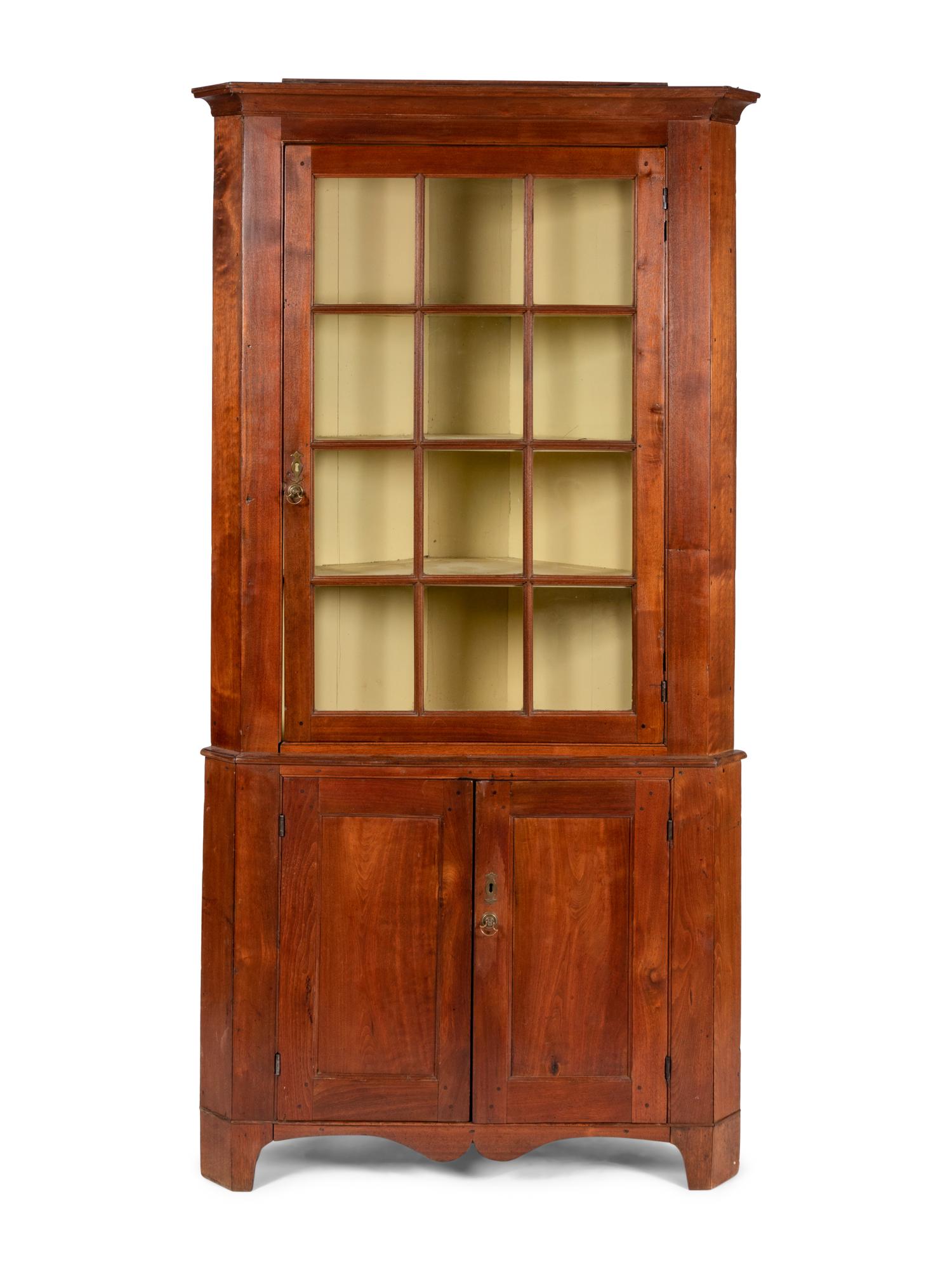 A Chippendale Cherrywood Corner Cupboard