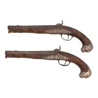 A Pair of Silver Mounted French Percussion Pistols